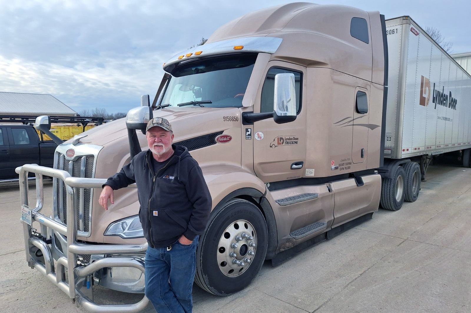 Doug-H-front-of-truck_alt